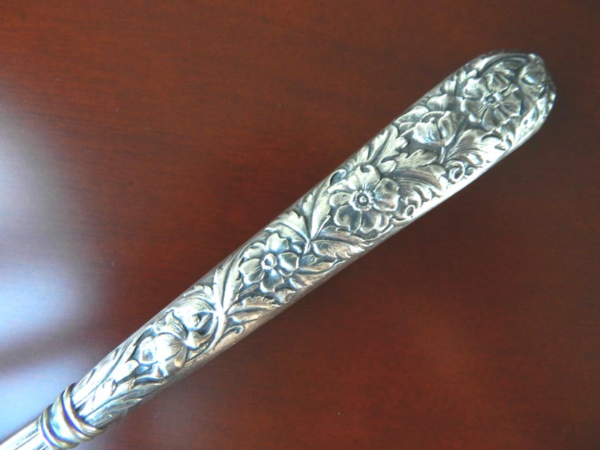  --   Sterling Handle Floral Repousse