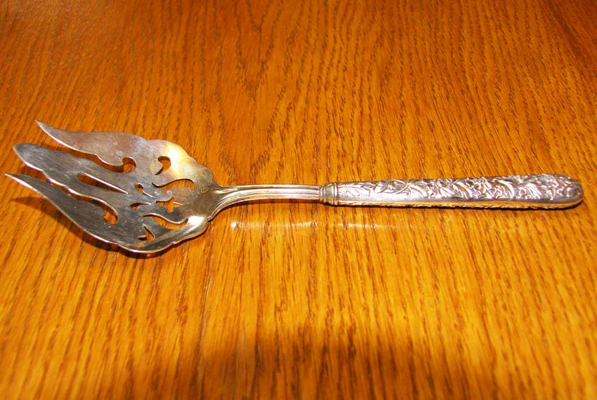    Sterling Handle Floral Repousse 